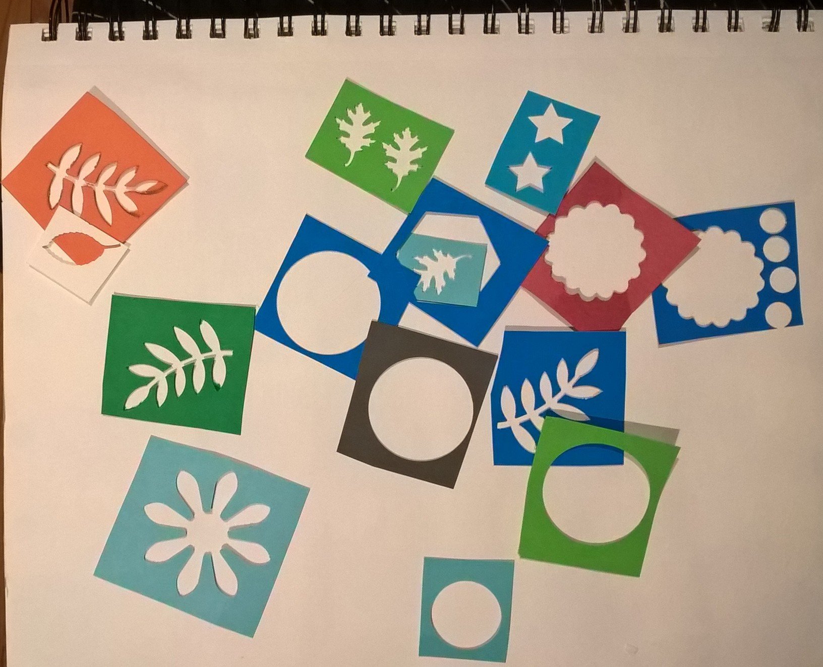 assortment of small stencils made with craft punches