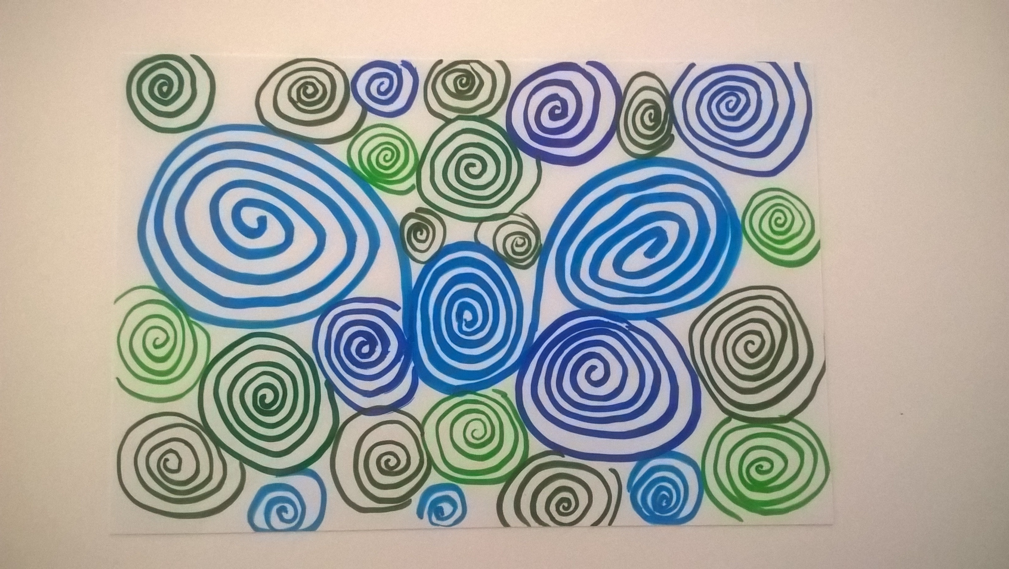 doodled spirals on photo paper