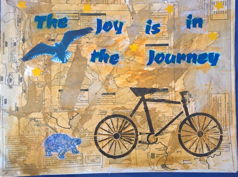 finished mixed media piece with quote using bike stencil and turtle stamp