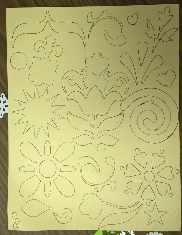 page full of designs created with stencils for coloring