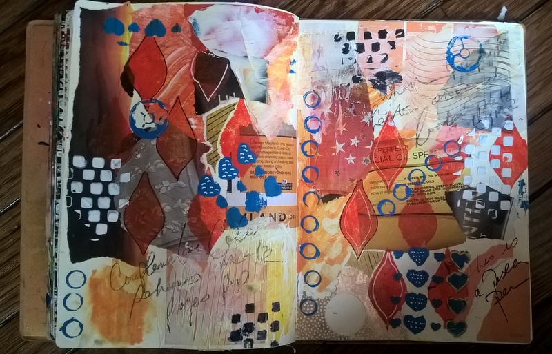 mixed media journal page in orange and blue scheme