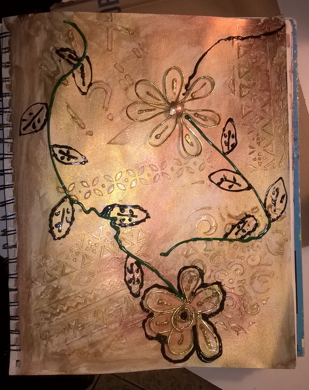 mixed media flower page created with gold paint and black dimensional paint